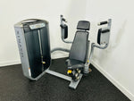 Load image into Gallery viewer, A black and gray Matrix G7 Commercial Pec Fly Machine with padded supports and adjustable seat, positioned on a floor with a white wall in the background.