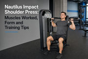 Nautilus Impact Shoulder Press being used with supported posture and controlled form