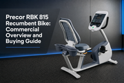 Precor RBK 815 recumbent bike with step-through frame, Air Flex seat and LED console in a commercial gym