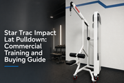 Star Trac Impact Lat Pulldown commercial belt-driven machine with seat, thigh pad, lat bar, and weight-stack enclosure