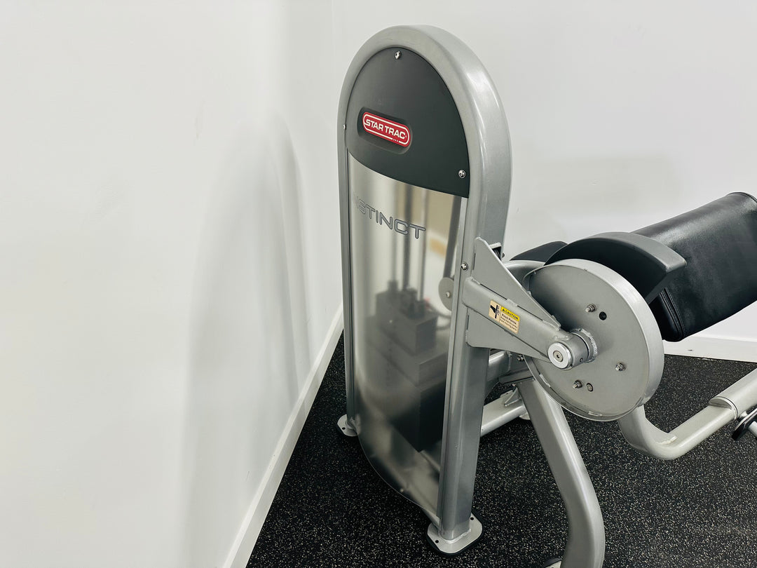 StarTrac Instinct Bicep Curl Machine